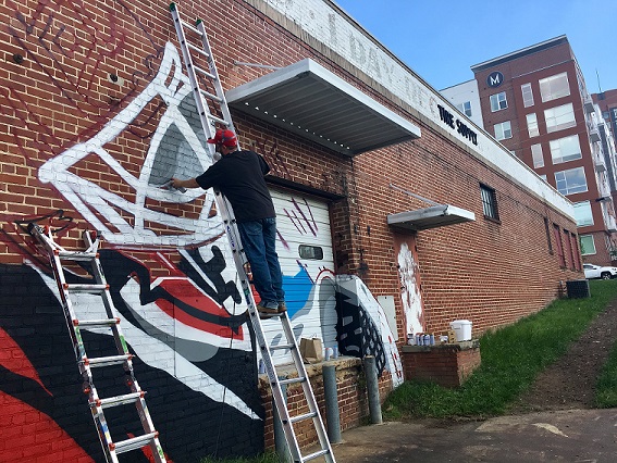 Carolina Hurricanes mural overtakes GoTriangle building in Raleigh.